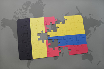 puzzle with the national flag of belgium and colombia on a world map background.
