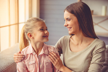 Mother and daughter at home