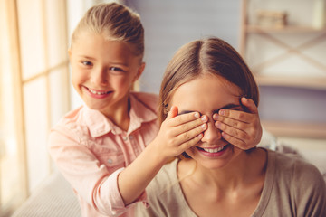Mother and daughter at home