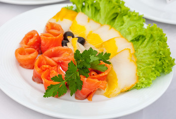 assorted fish slices with salad