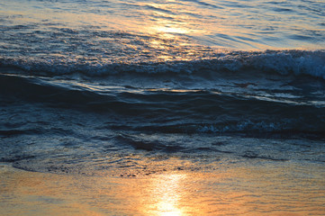 Brilliant sunrise over the waters of lake Huron in Oscoda, Michigan