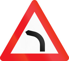 Warning road sign used in Denmark - Dangerous curve to left