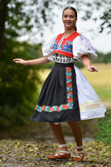 Young woman in slovakian clothes