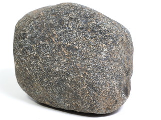 Single natural stone on white background