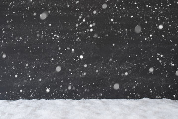 Black Cement Wall With Snow As Background Or Texture, Snowflakes