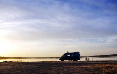 caravan silhouette in alqueva lake, Portugal