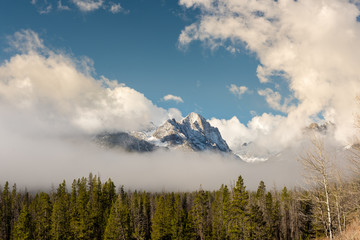 Clear fog around a high mountain peak