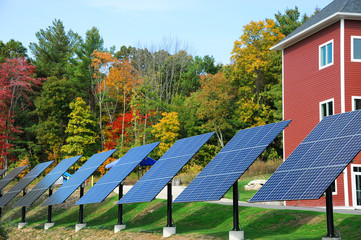 solar panels in a row in front of the building