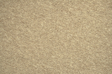 Close-up of beige closed-loop carpet, material texture