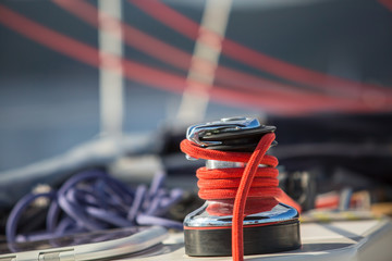 Sailboat winch and rope yacht detail. Yachting on the Sea.