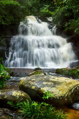 Mun Dang Waterfall in deep forest fresh green rain season in Tha