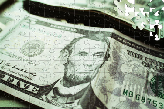 Five Dollar Bill Puzzle Stock Photo
