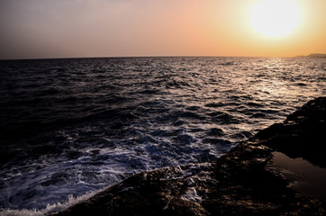 Strong Waves Crashing on the Volcanic Coast