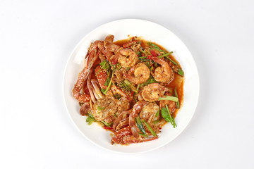 Stir-fried crab and shrimp in curry power is top-ten of popular Thai food as seafood to fried with  fresh milk ,grill curry ,egg ,oyster oil and yellow curry power. 