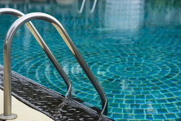 Swimming pool with stair at hotel