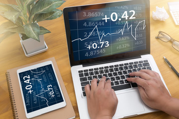 Business Team Workin economics and Graphs Interfaces market stoc
