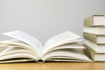 Books lying on the wooden table