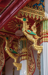 Fototapeta na wymiar Golden swan statue at the temple Chanthaburi, Thailand.