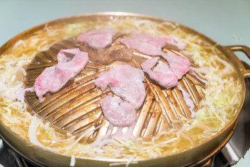 pork sliced grilling on hot pan