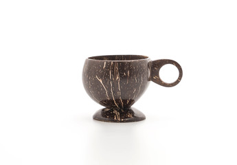 Coconut shell cup with wooden handle
