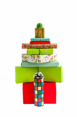  Isolated pile of the packed colorful boxes, gift boxes  arranged in a Christmas tree shape