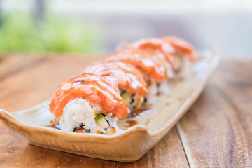 salmon burned maki with teriyaki sauce