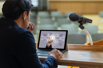 Businessman sitting and using computer laptop showing the Social