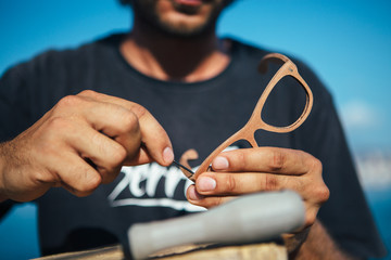 Anonymous master makes wooden rim glassses