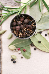 Mixed pepper corns and rosemary (Rosmarinus officinalis)