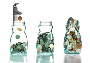 Faucet putting mix coins in clear bottle on white background,Bus