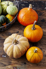 Pumpkins on wooden background