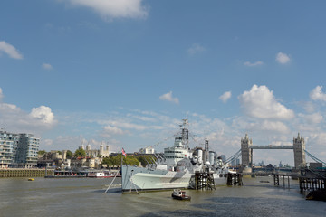 HMS Belfast and Tower Bridge on the River Thames in London