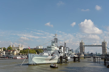 HMS Belfast and Tower Bridge on the River Thames in London