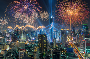 Fototapeta premium Top view of Bangkok Cityscape at night with Multicolor Firework