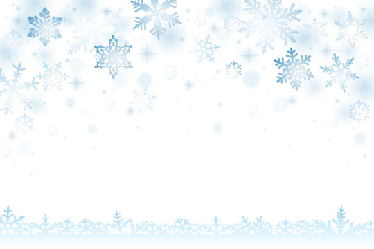 Winter background with falling snowflakes and snow