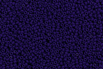 Dark blue glass beads texture.