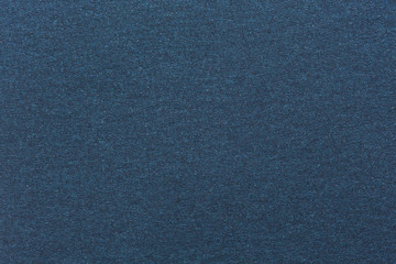 Texture of dark blue color paper.