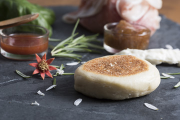 the tigella is a dish very very typical of Emilia, Italy region. It is stuffed with sauces and vegetables and pork cuts