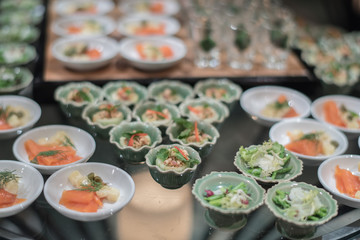 Variety of finger food on catering event. Shallow focus. Table with catering food. Snacks on table