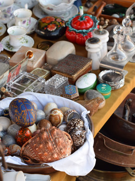Antique vintage market in  Milan. Decorative Eggs, exotic shells and old dishes.