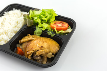 Roasted chicken with rice and vegetable salad.