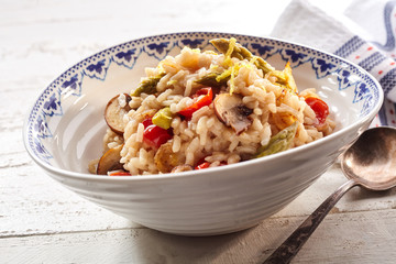 Little bowl of rice with mushrooms and veggies