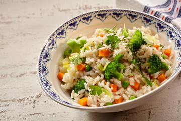 Bowl of delicious veggies and rice in bowl