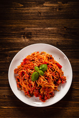 Spaghetti with meat, tomato sauce and vegetables