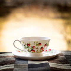 Tea cup in a vignette background