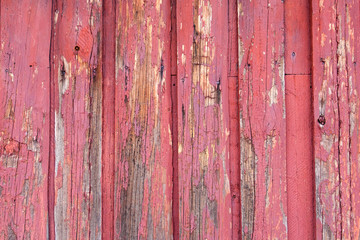 Red painted wood planks as background or texture. Close-up