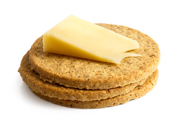 Pile of Scottish oatcakes with a slice of yellow cheese.