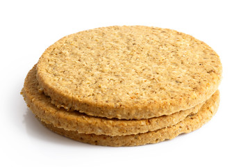 Pile of Scottish oatcakes isolated on white.
