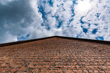 back-lighted photo from a brick wall of a barn, germany