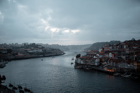  high view of the old city Porto, rain and summer end day